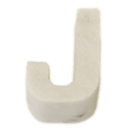 Lettera Helvetica in marmo bianco