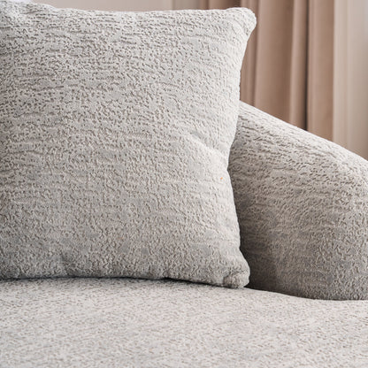 Divano componibile moderno a L in ciniglia con chaise longue curva e 4 cuscini per soggiorno