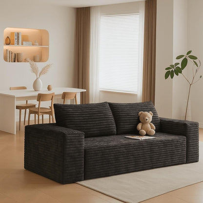 Divano moderno senza struttura rivestito in tessuto di velluto a coste, per soggiorno, studio o sala di intrattenimento.