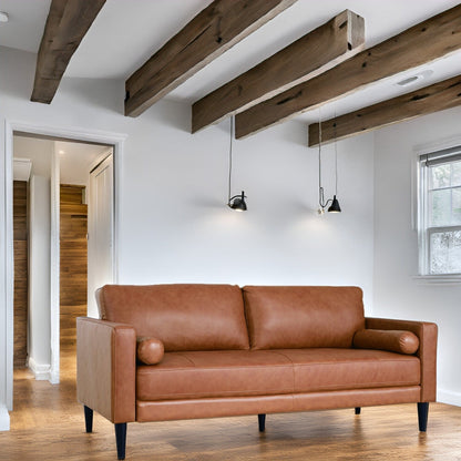Divano moderno in vera pelle con gambe in legno e cuscino di supporto aggiuntivo