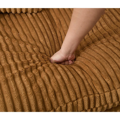 Divano componibile modulare moderno a 4 posti in velluto a coste a forma di L con design curvo e cuscini per lo schienale per il soggiorno