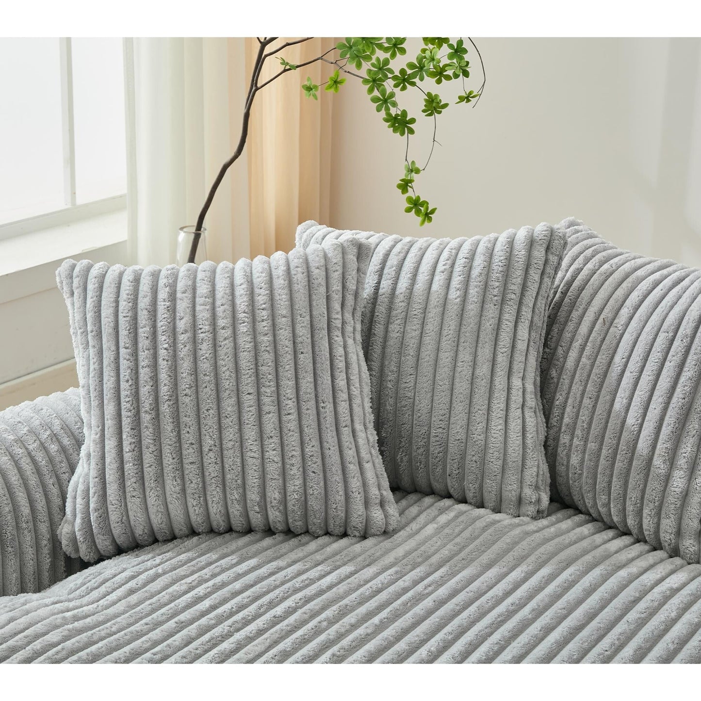 Divano componibile modulare moderno a 4 posti in velluto a coste a forma di L con design curvo e cuscini per lo schienale per il soggiorno