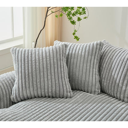 Divano componibile modulare moderno a 4 posti in velluto a coste a forma di L con design curvo e cuscini per lo schienale per il soggiorno