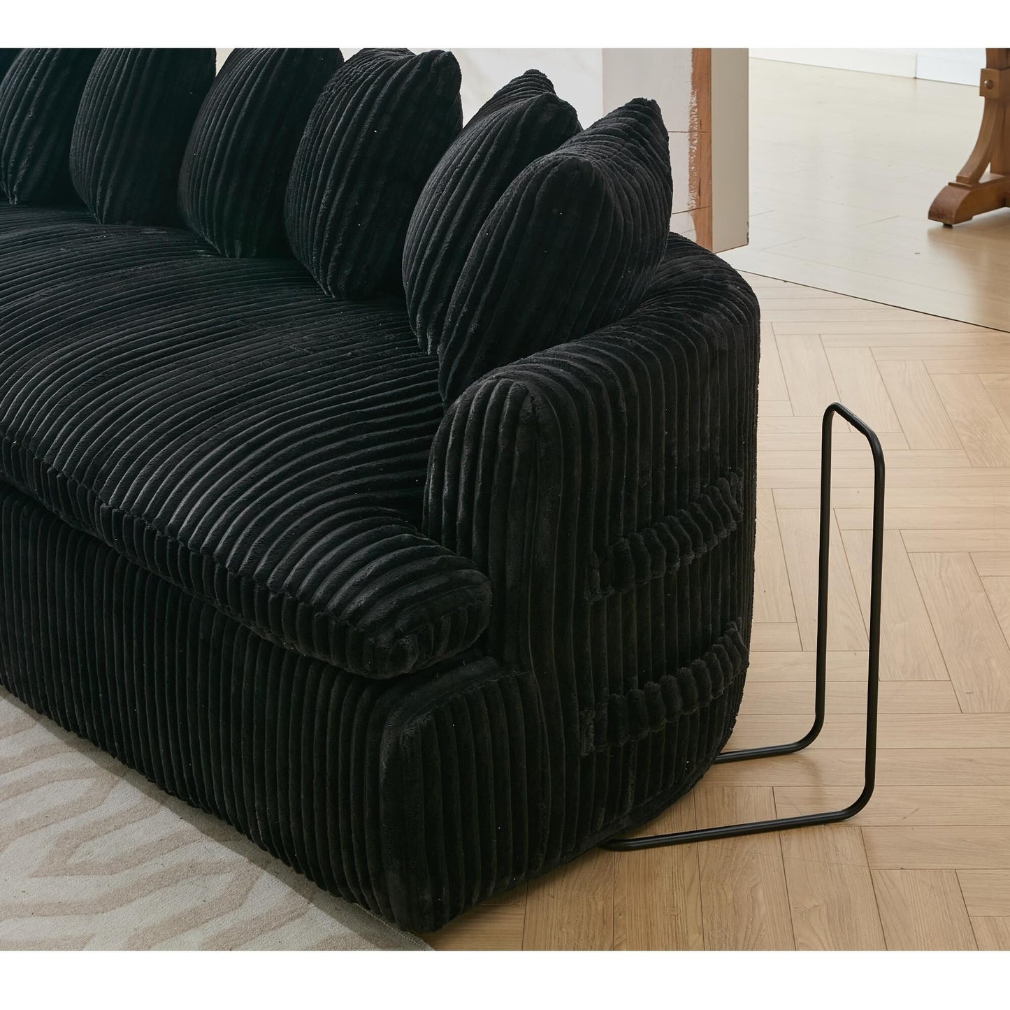 Divano componibile modulare moderno a 4 posti in velluto a coste a forma di L con design curvo e cuscini per lo schienale per il soggiorno