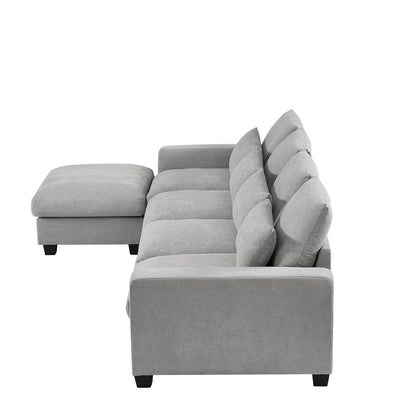 Divano componibile moderno a forma di L imbottito in piume con chaise longue reversibile e cuscini per soggiorno