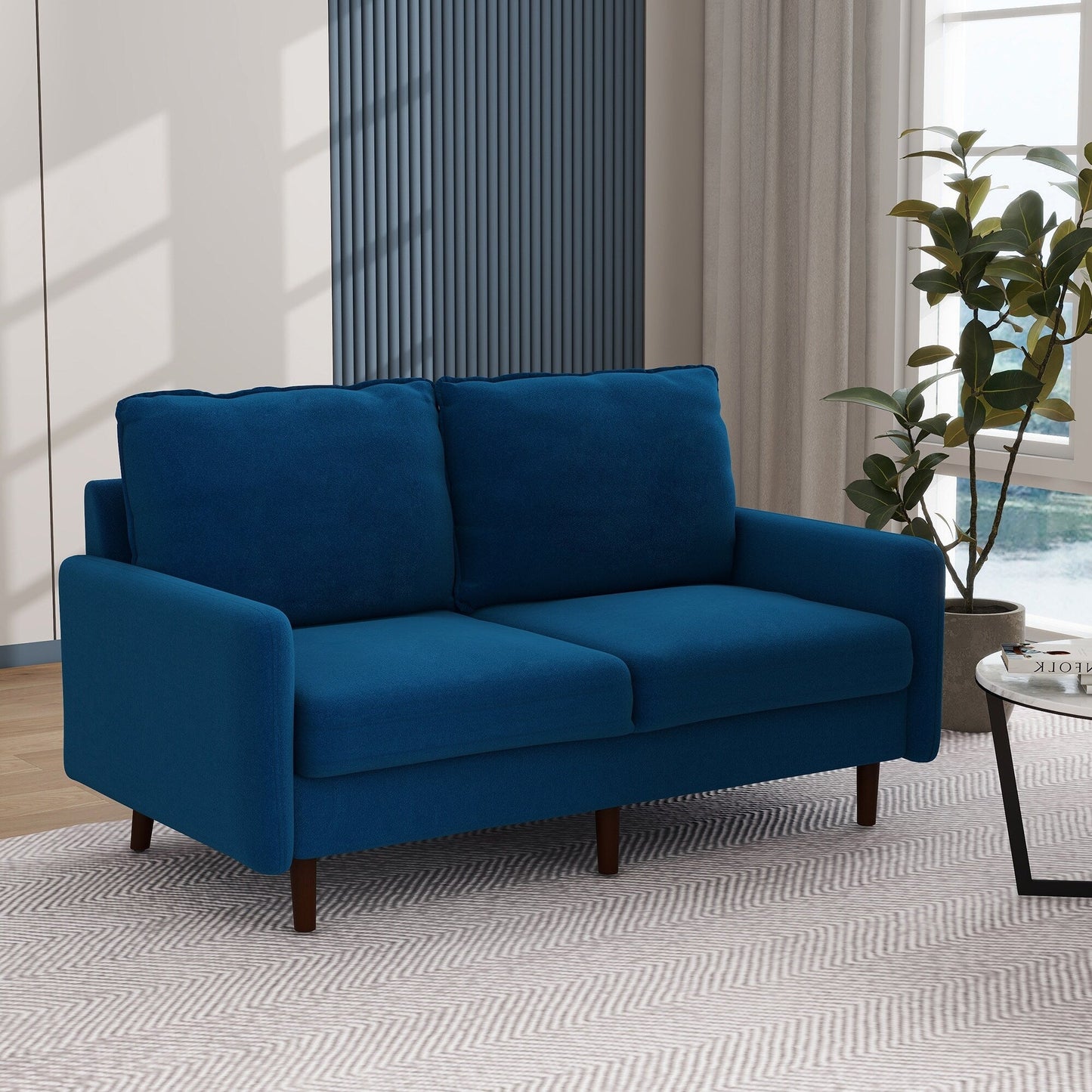 Divano moderno con gambe in legno e velluto