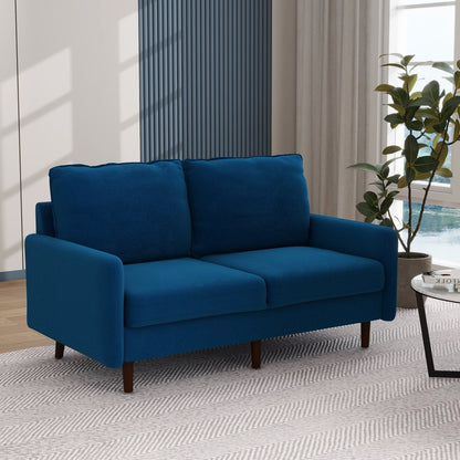 Divano moderno con gambe in legno e velluto