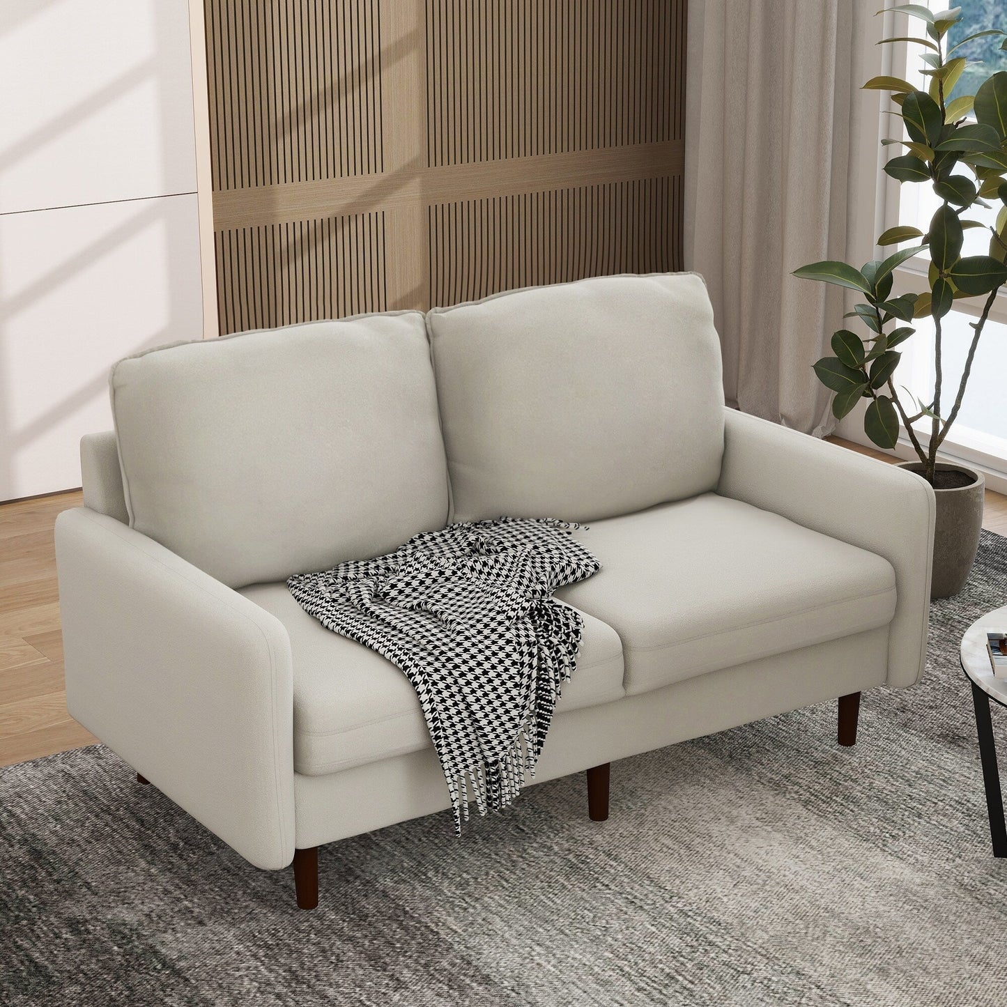 Divano moderno con gambe in legno e velluto