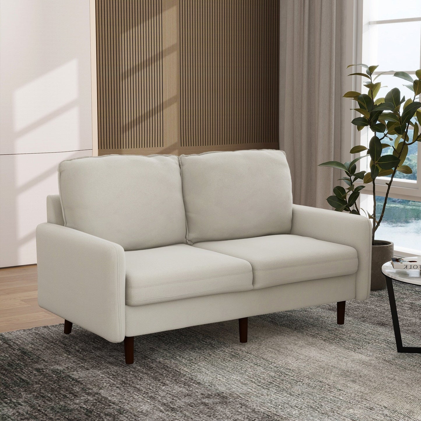 Divano moderno con gambe in legno e velluto