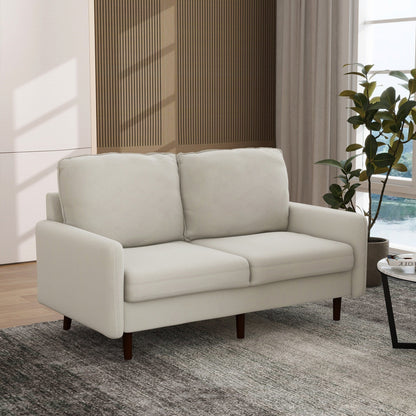 Divano moderno con gambe in legno e velluto