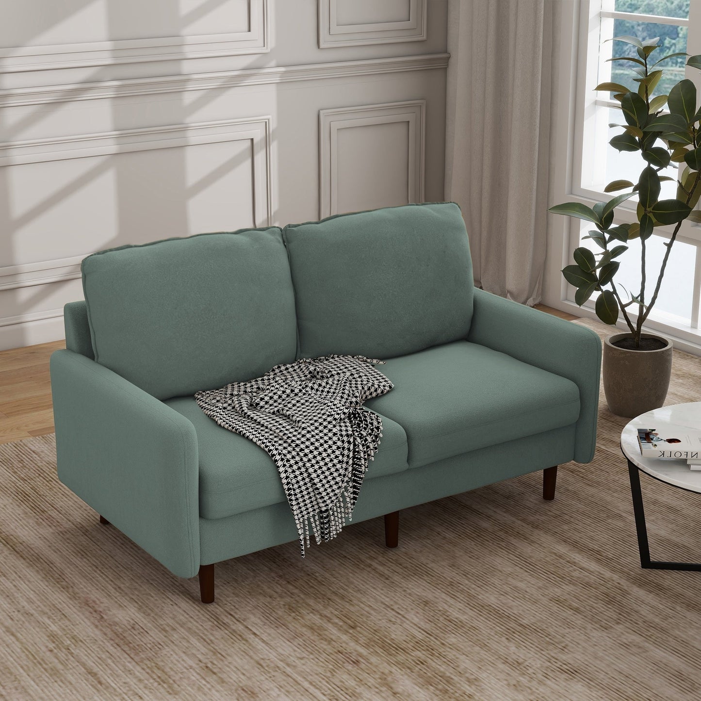 Divano moderno con gambe in legno e velluto