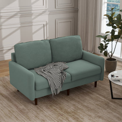 Divano moderno con gambe in legno e velluto