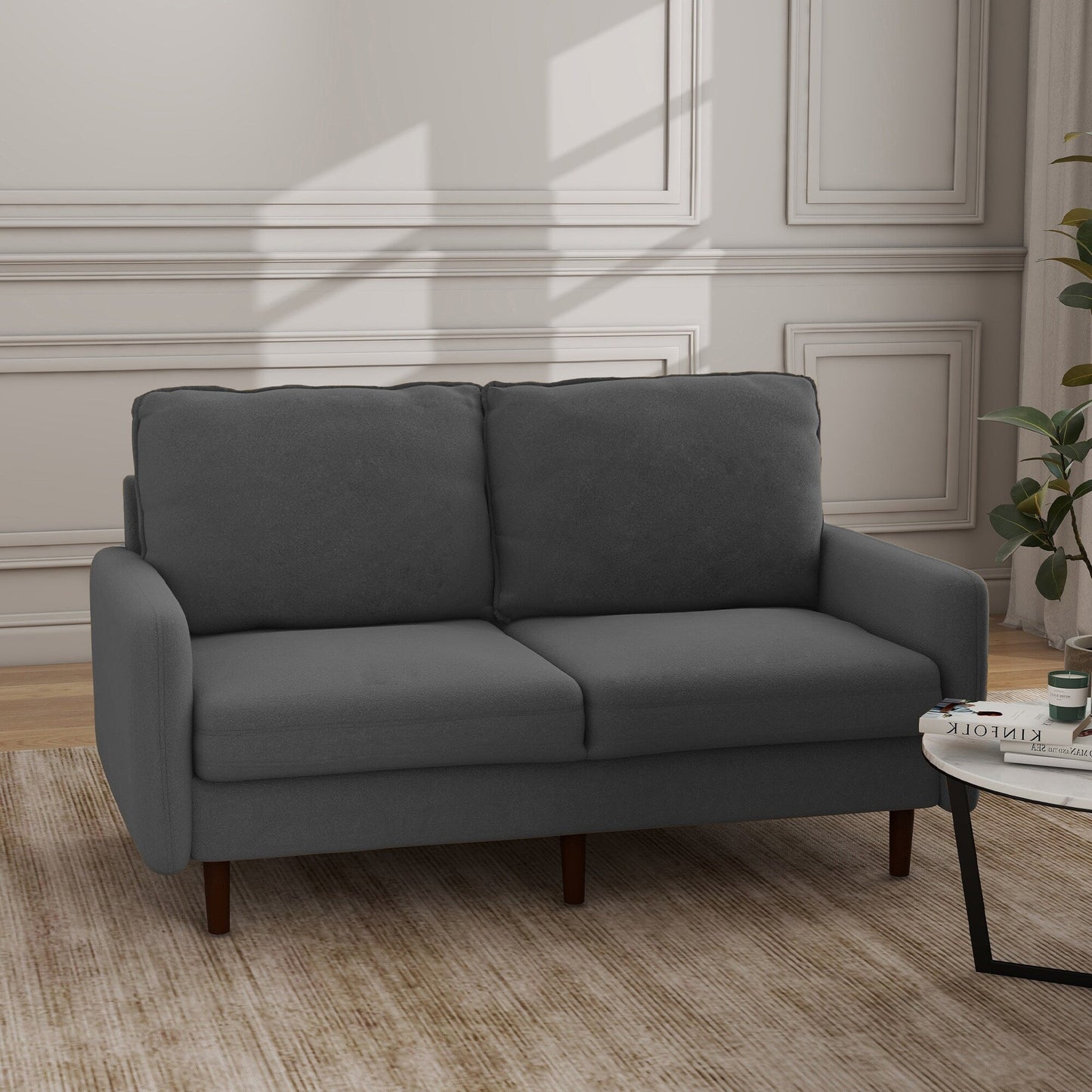 Divano moderno con gambe in legno e velluto