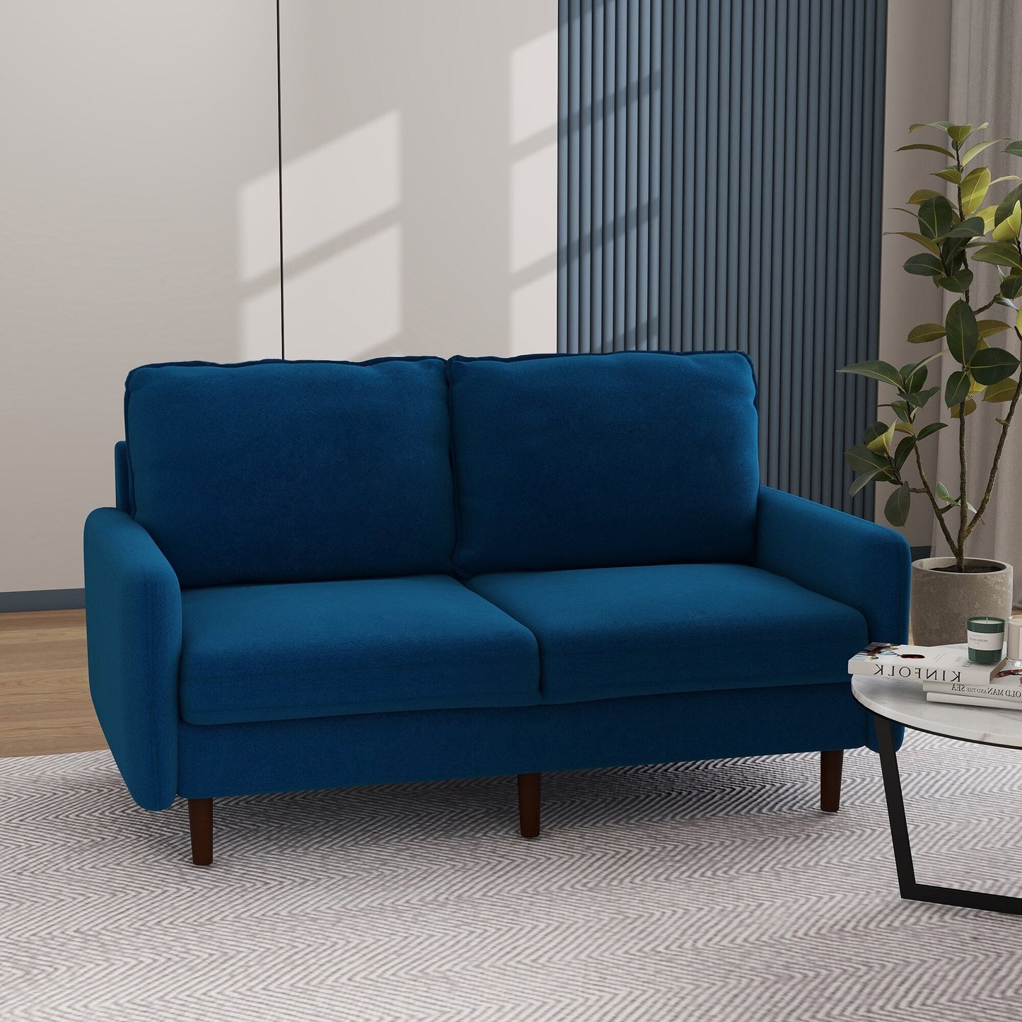 Divano moderno con gambe in legno e velluto