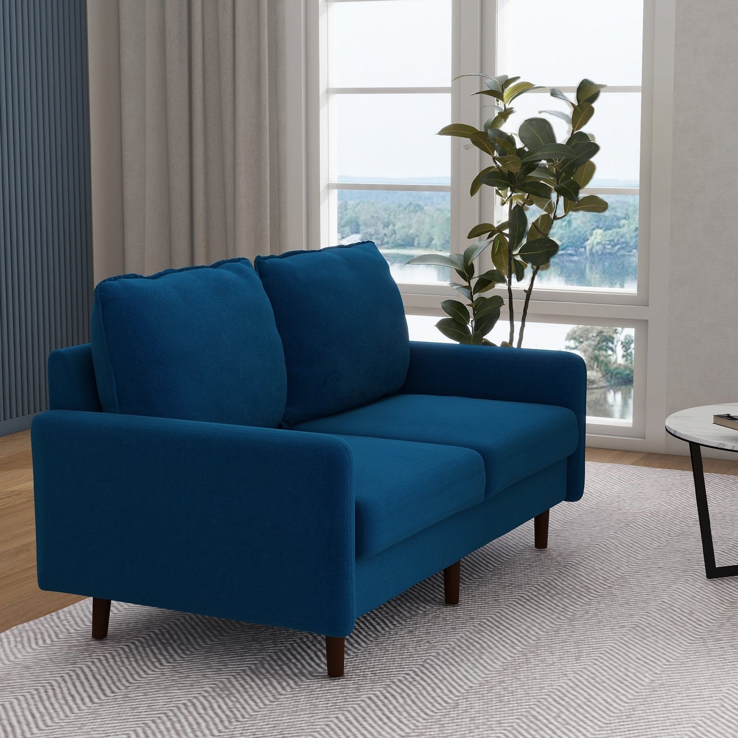 Divano moderno con gambe in legno e velluto