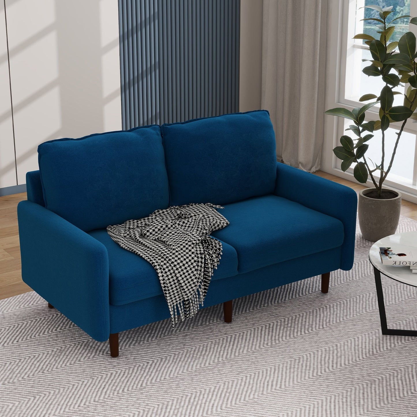 Divano moderno con gambe in legno e velluto