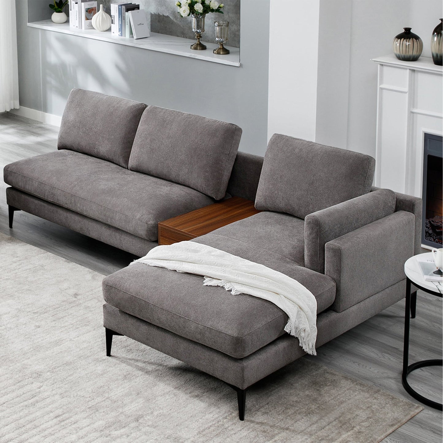 Divano modulare a L con design reversibile e scatola decorativa in legno integrata