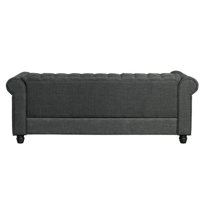 Divano Chesterfield Morden Fort Linen con bottoni trapuntati, borchie e gambe in legno massello per soggiorno