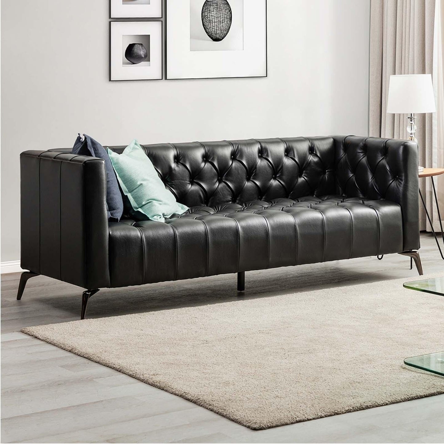 Divano Nestor Transitional in vera pelle con gambe in metallo e schienale capitonné