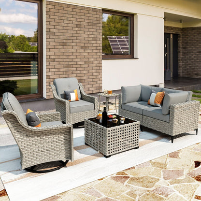 Set di 6 sedie girevoli in vimini per esterni OVIOS con tavolino da caffè a energia solare