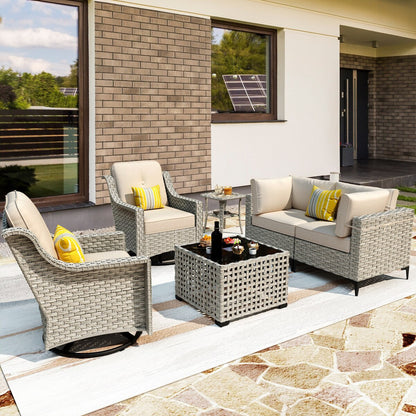 Set di 6 sedie girevoli in vimini per esterni OVIOS con tavolino da caffè a energia solare