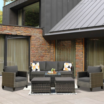 Set da conversazione in vimini per patio esterno OVIOS da 6 pezzi con tavolo con piano in vetro