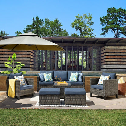 Set da conversazione in vimini per patio esterno OVIOS da 6 pezzi con tavolo con piano in vetro