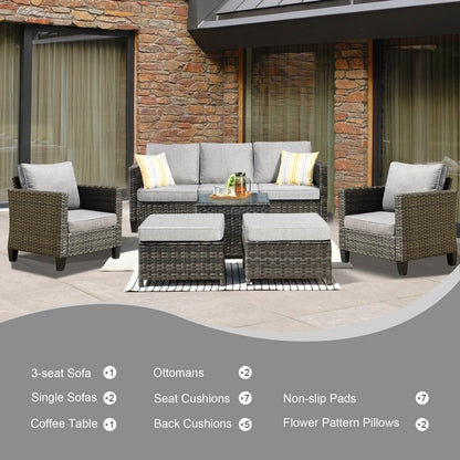 Set da conversazione in vimini per patio esterno OVIOS da 6 pezzi con tavolo con piano in vetro