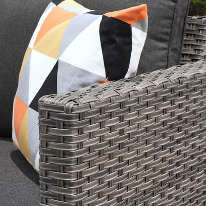 Set da conversazione in vimini per patio esterno OVIOS da 6 pezzi con tavolo con piano in vetro