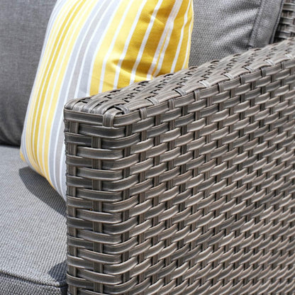 Set da conversazione in vimini per patio esterno OVIOS da 6 pezzi con tavolo con piano in vetro