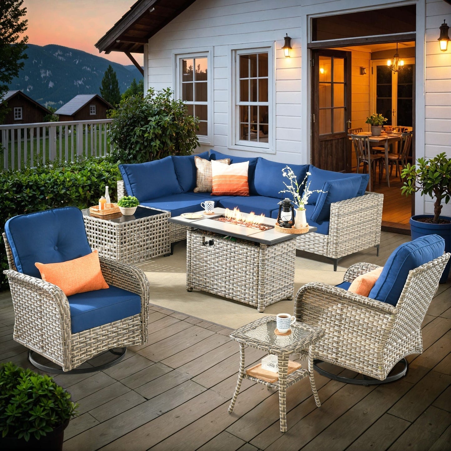 Set di 9 sedie girevoli in vimini per esterni OVIOS con tavolo da fuoco