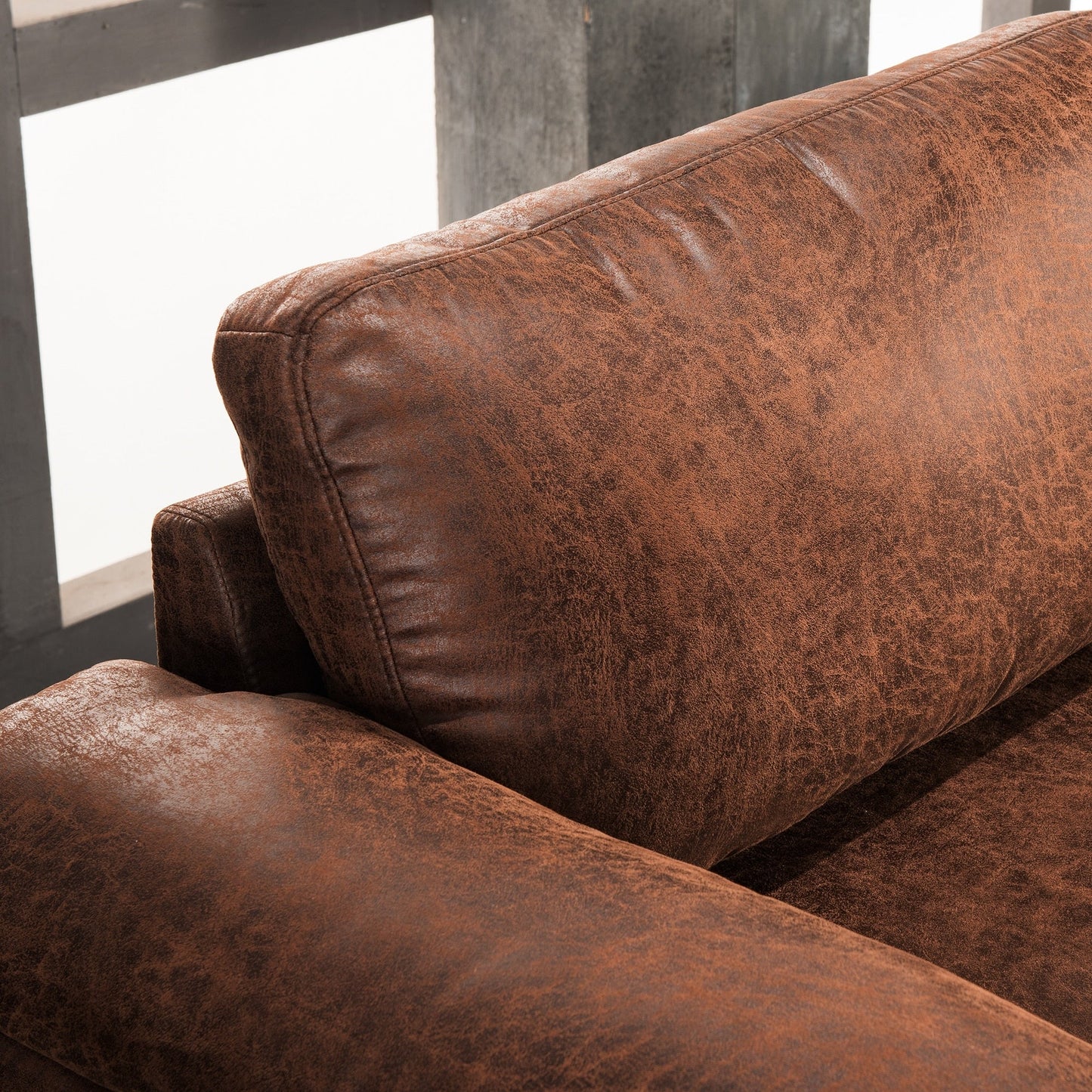 Divano chaise longue reversibile OVIOS Mid-Century in pelle scamosciata con gambe in metallo