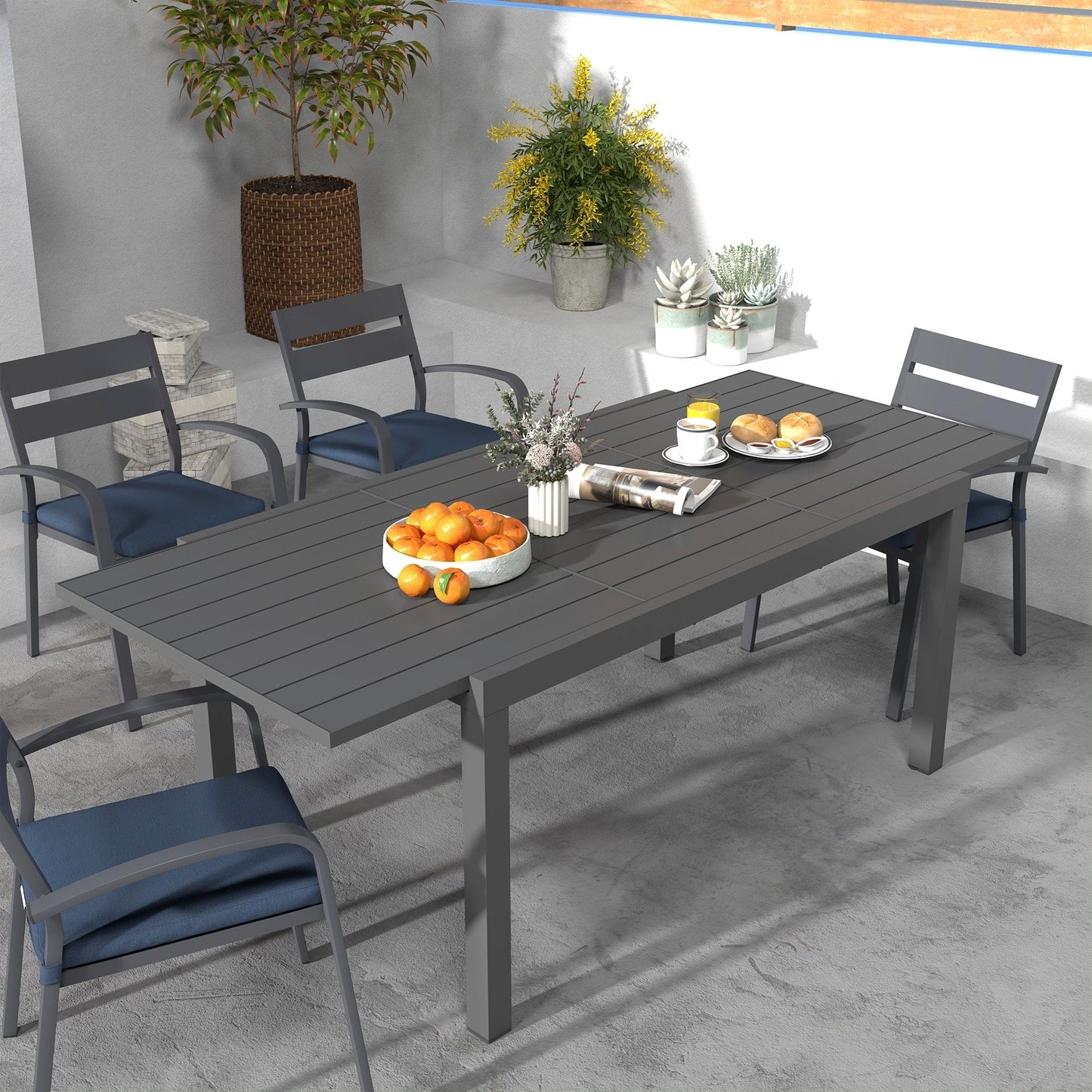 Set da pranzo per esterni in alluminio da 9 pezzi con sedie impilabili e tavolo allungabile