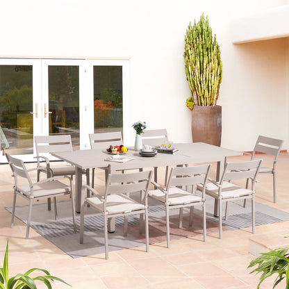 Set da pranzo per esterni in alluminio da 9 pezzi con sedie impilabili e tavolo allungabile