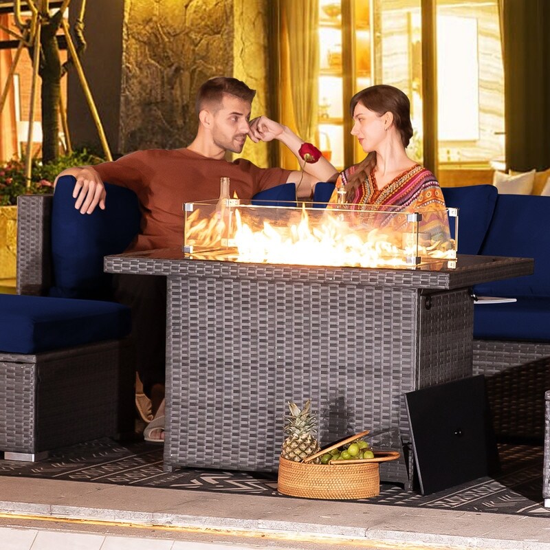 Set di divani componibili per esterni FINCATI in vimini grigio con tavolo e braciere