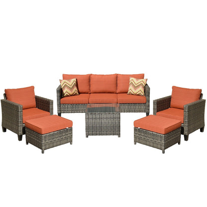 Set da conversazione in vimini per patio esterno OVIOS da 6 pezzi con tavolo con piano in vetro