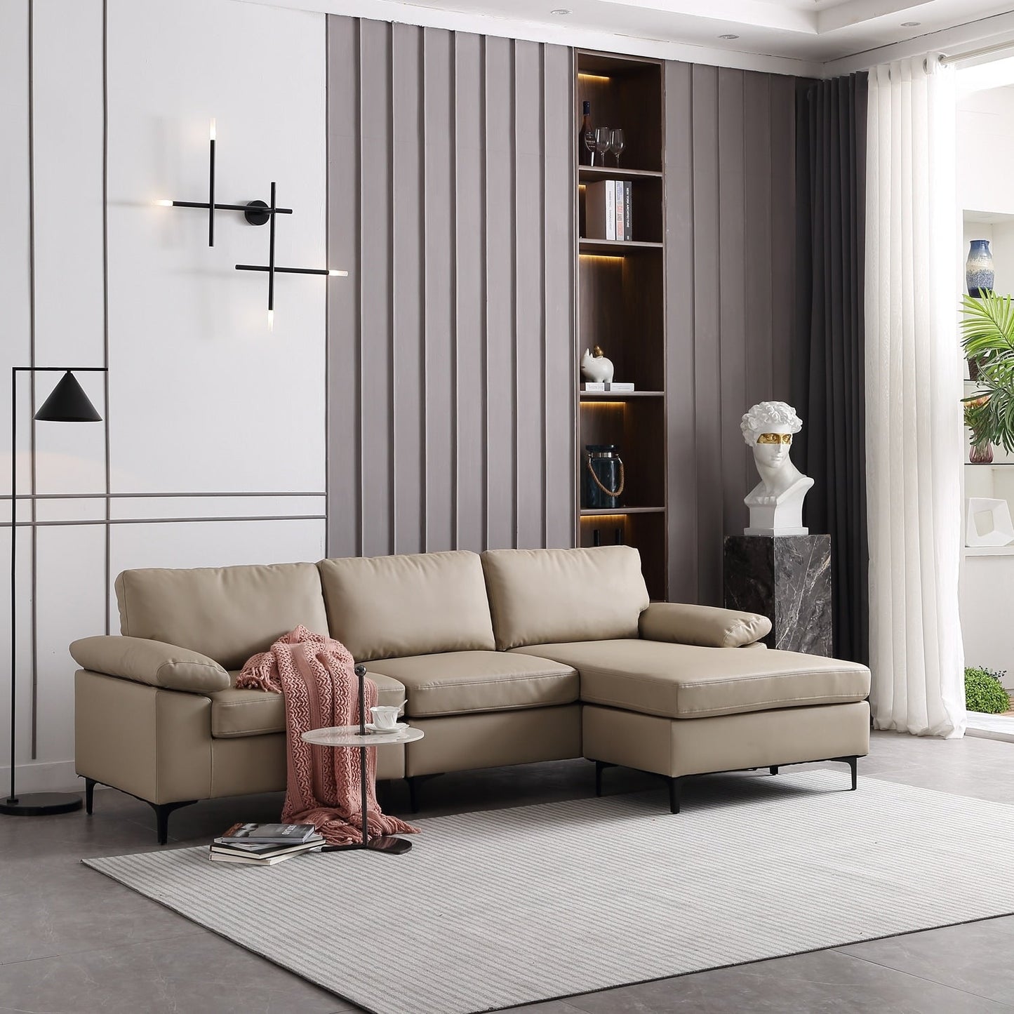 Divano chaise longue reversibile OVIOS con cuscini soffici e gambe in metallo