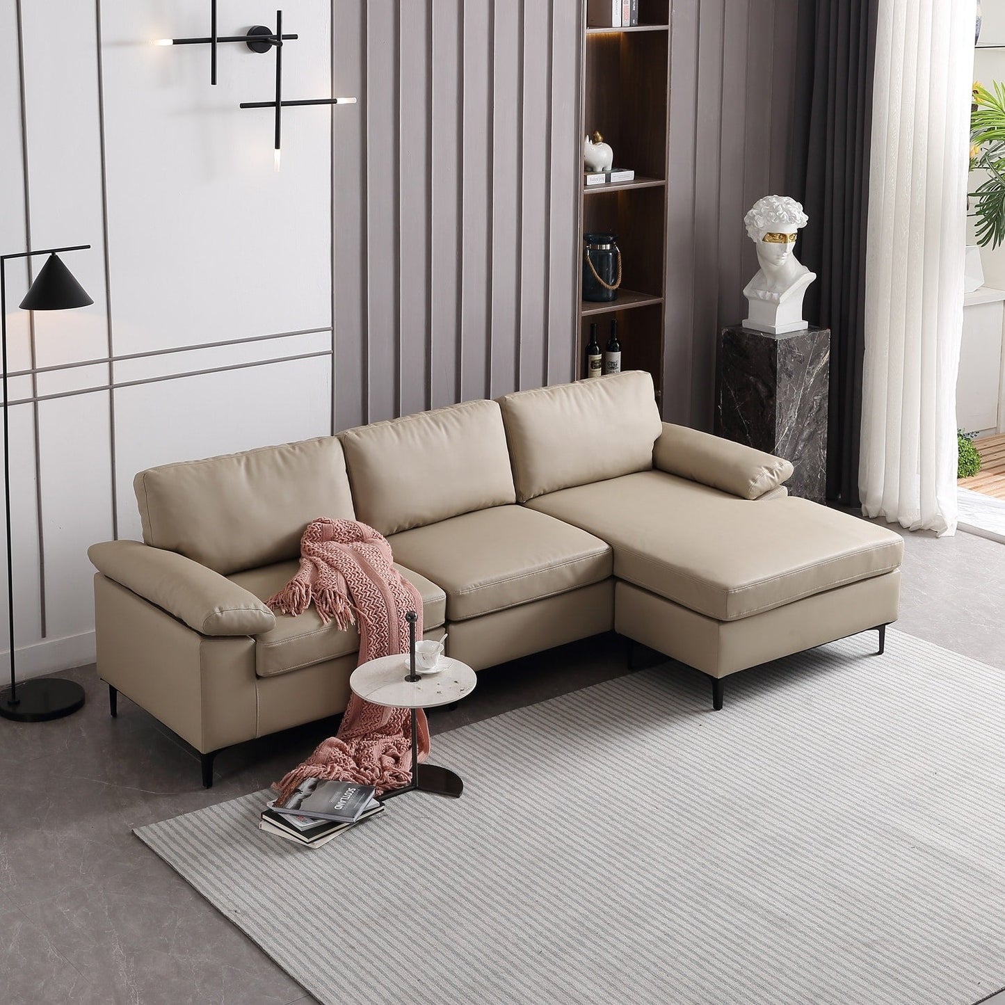 Divano chaise longue reversibile OVIOS con cuscini soffici e gambe in metallo