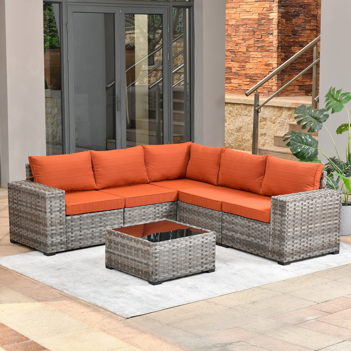 Set da 6 pezzi con tavolo e braccioli larghi per mobili da giardino in vimini OVIOS