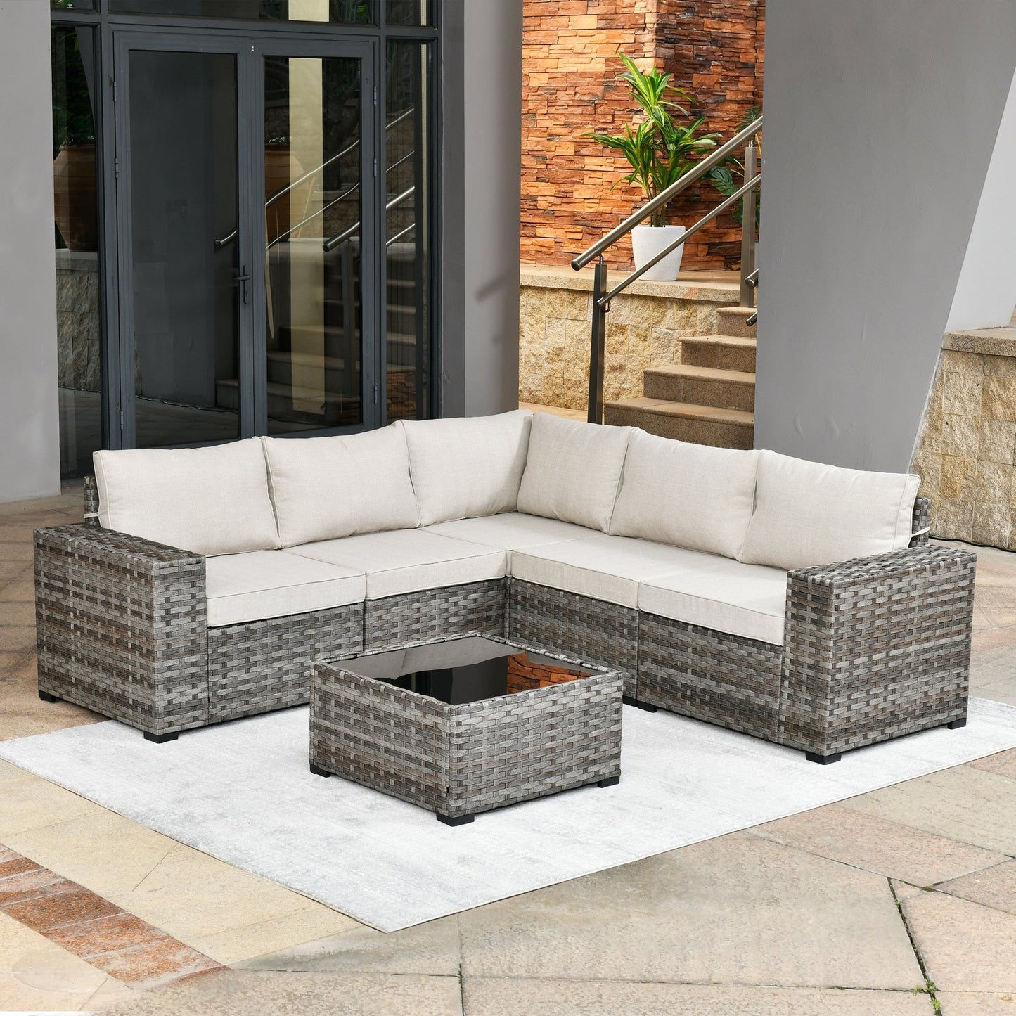 Set da 6 pezzi con tavolo e braccioli larghi per mobili da giardino in vimini OVIOS