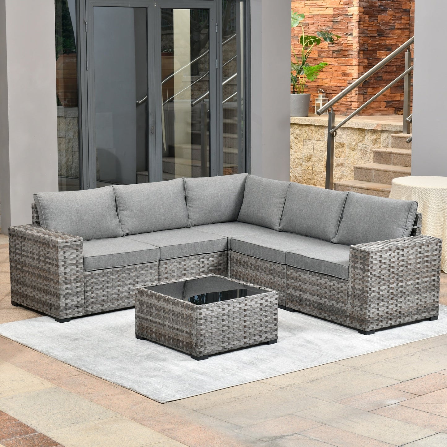 Set da 6 pezzi con tavolo e braccioli larghi per mobili da giardino in vimini OVIOS