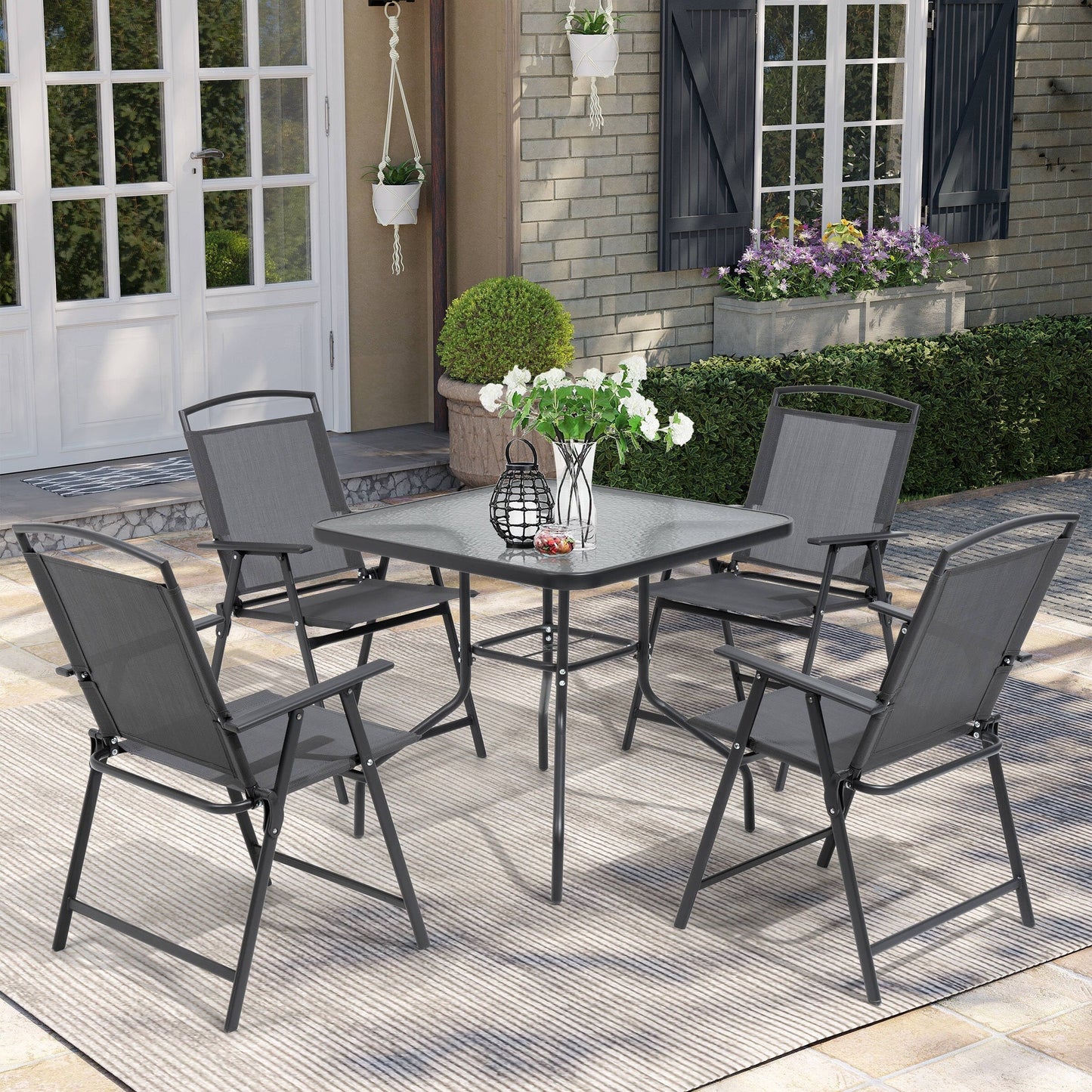 Set da pranzo da esterno Pellebant da 5 pezzi con sedie pieghevoli