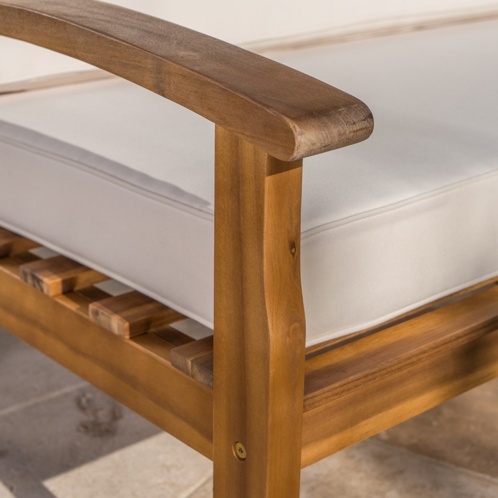 Set di divano e tavolo da esterno in legno di acacia imbottito Peyton di Christopher Knight Home