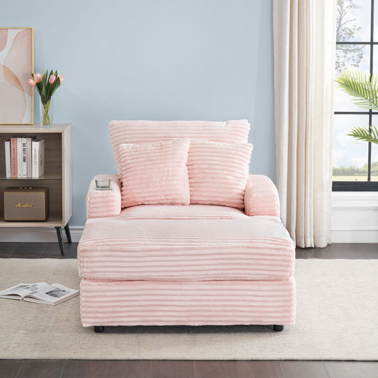 Poltrona in velluto a coste rosa con pouf e portabicchieri