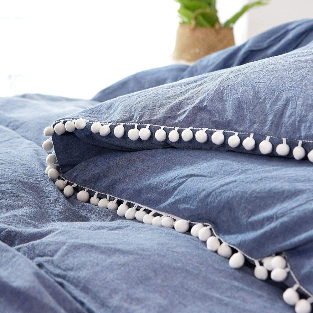 Set copripiumino reversibile in cotone con pompon