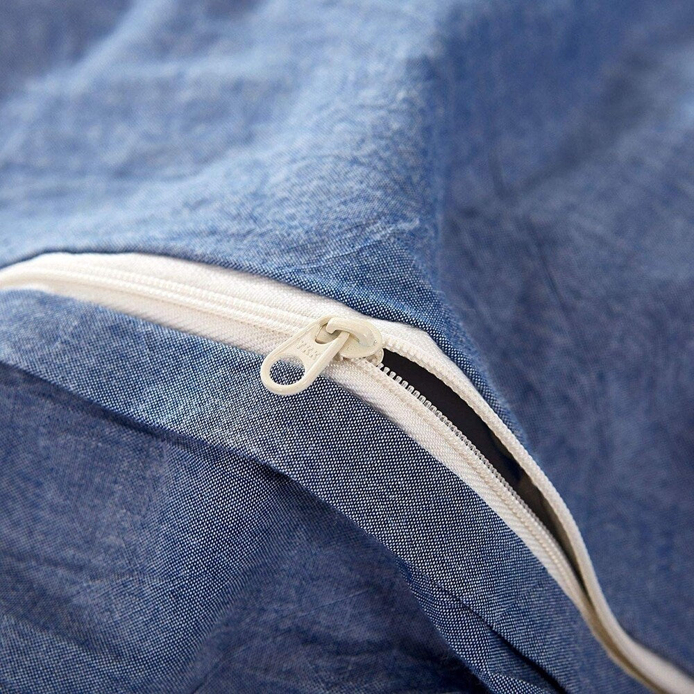 Set copripiumino reversibile in cotone con pompon