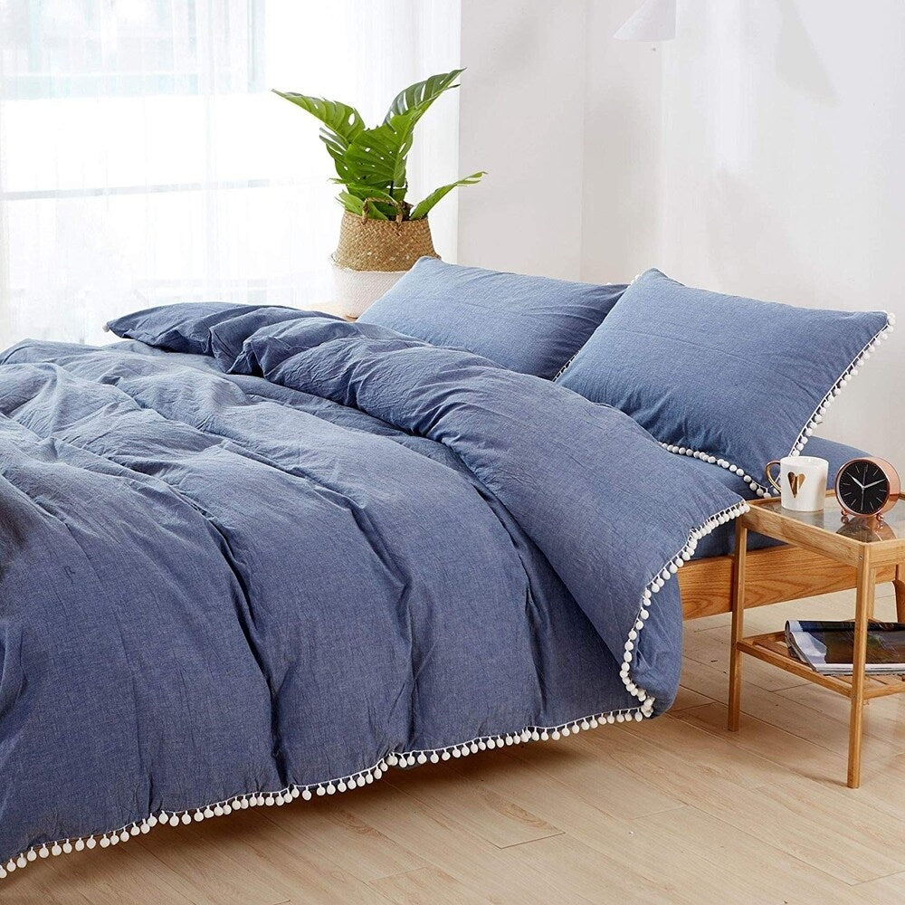 Set copripiumino reversibile in cotone con pompon