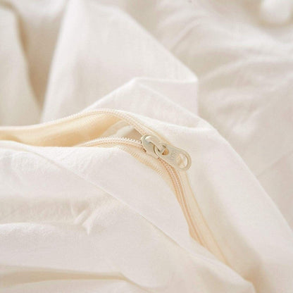 Set copripiumino reversibile in cotone con pompon