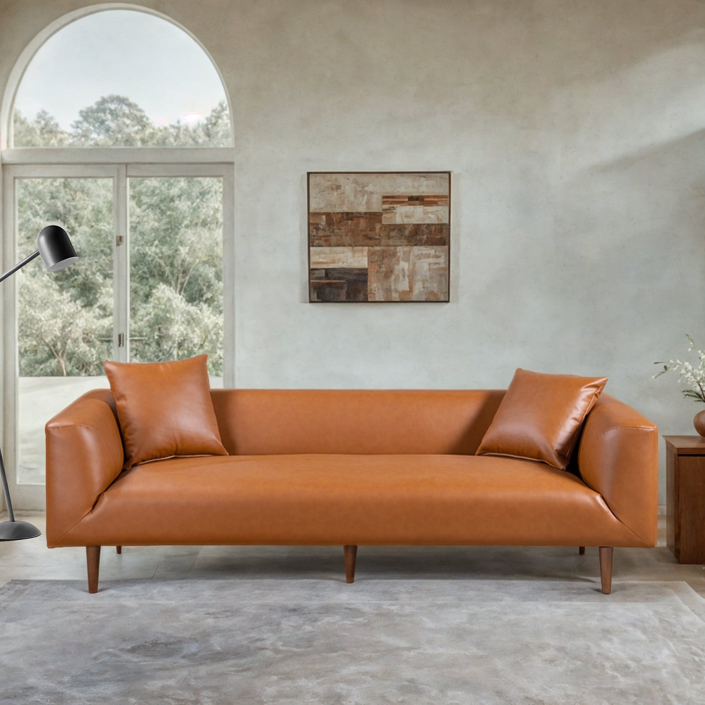 Divano curvy in pelle color cognac Ritson 87 Wide Mid Century Modern