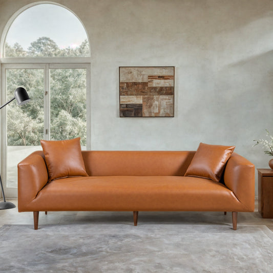 Divano curvy in pelle color cognac Ritson 87 Wide Mid Century Modern